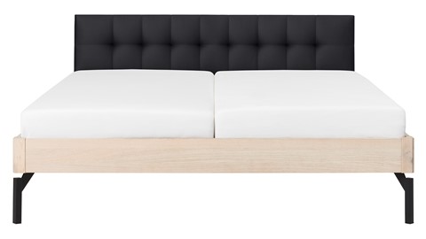 Bed Sky eiken met hoofdbord gecapitonneerd en poot metaal, eiken lederlook zwart