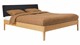 Bed Sky eiken met hoofdbord gecapitonneerd en poot hout, honing lederlook zwart