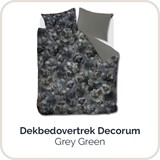 een bed met grijze bloemen