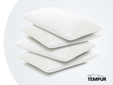 een stapel witte kussens