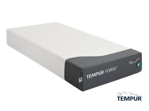 een matras met een witte hoes