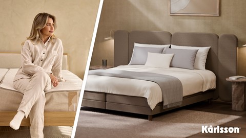 Een vrouw die op een bed zit