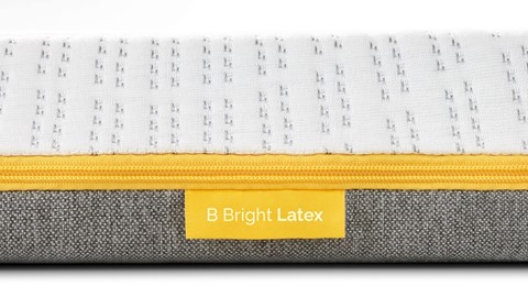 Zijkant latex topper met gele rits B Bright