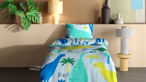 Een bed met een dinosaurusontwerp