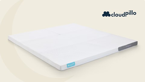 Een wit matras op een wit oppervlak